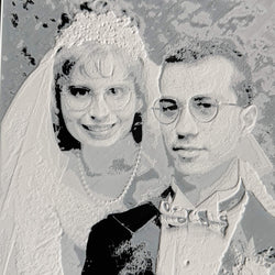 Custom 3D printed photo relief of a couple capturing detailed textures and personalized design
