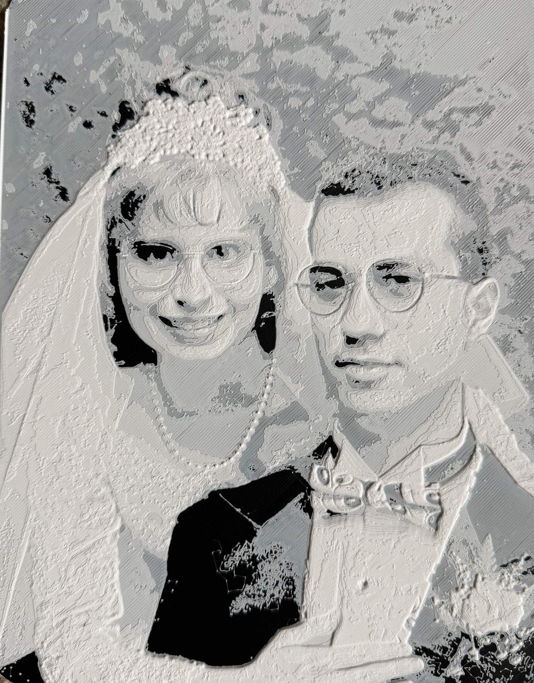Custom 3D printed photo relief of a couple capturing detailed textures and personalized design