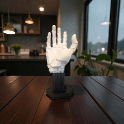 3D-printed robot hand controller stand with detailed mechanical joints and sleek metallic finish for gaming setups
