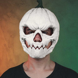 Pumpkin Head Mask in white with a dark green stem, carved skull face, deep eye openings and jagged teeth